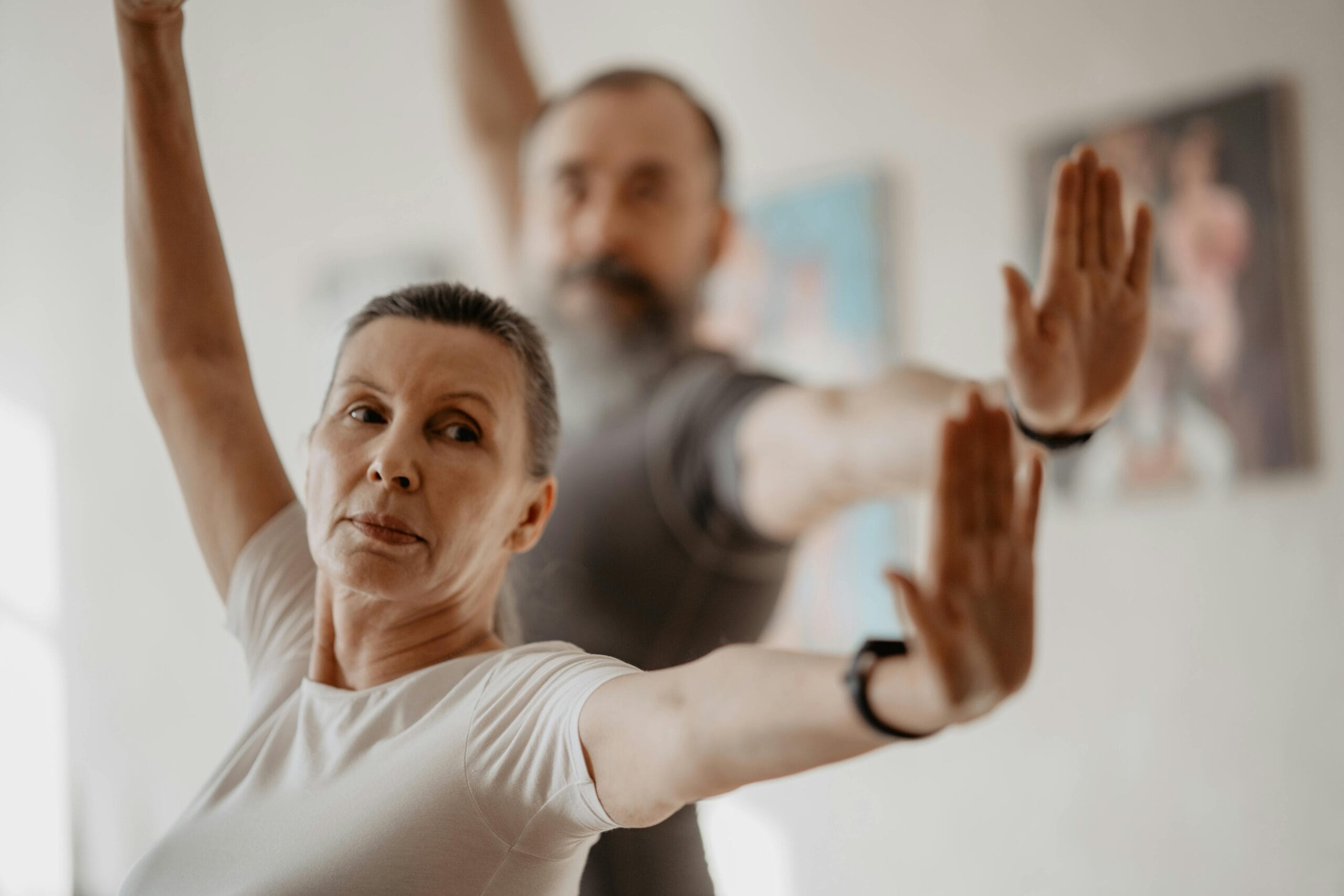 man and woman stretching