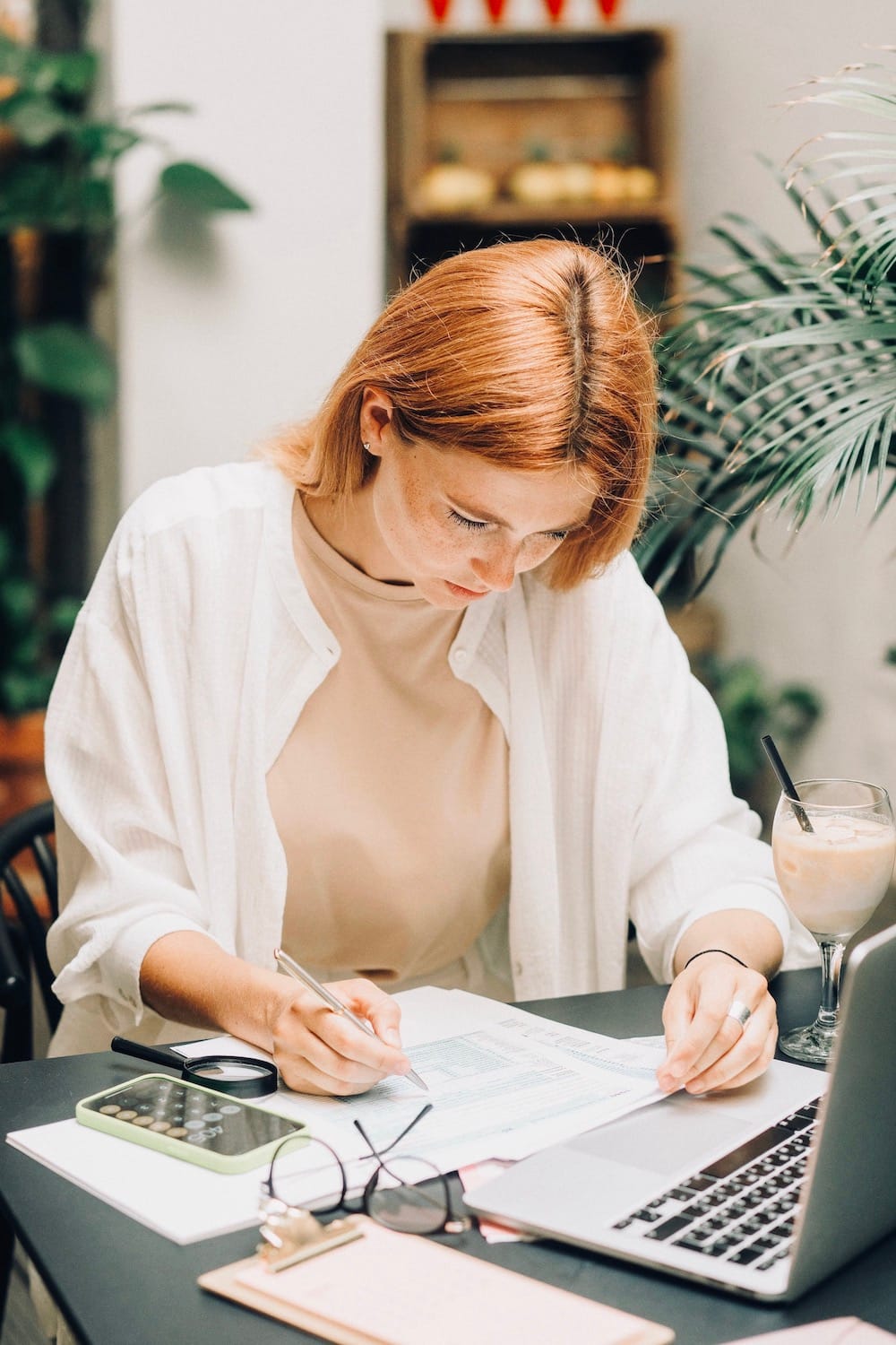 woman writing a treatment plan